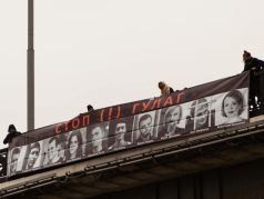 Баннер с фотографиями политзаключеных.  Фото: Александр Софеев / Facebook